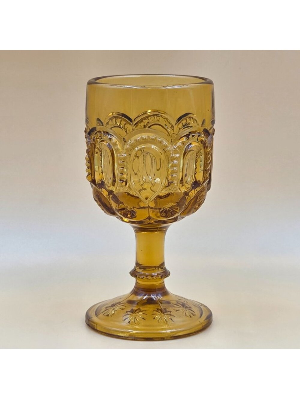 L E Smith Moon and Star Amber Glass Wine Goblet Vintage Footed Stemware